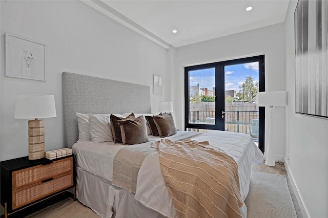 bedroom with baseboards, access to outside, french doors, and recessed lighting