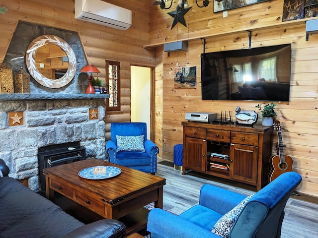 25 E Reindeer Trl, Bethel, NY 12778 - living area featuring wooden walls, an AC wall unit, wood finished floors, and a fireplace