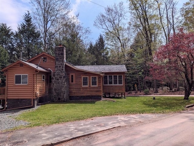 25 E Reindeer Trl, Bethel, NY 12778 - cabin with a front lawn, log veneer siding, and a chimney