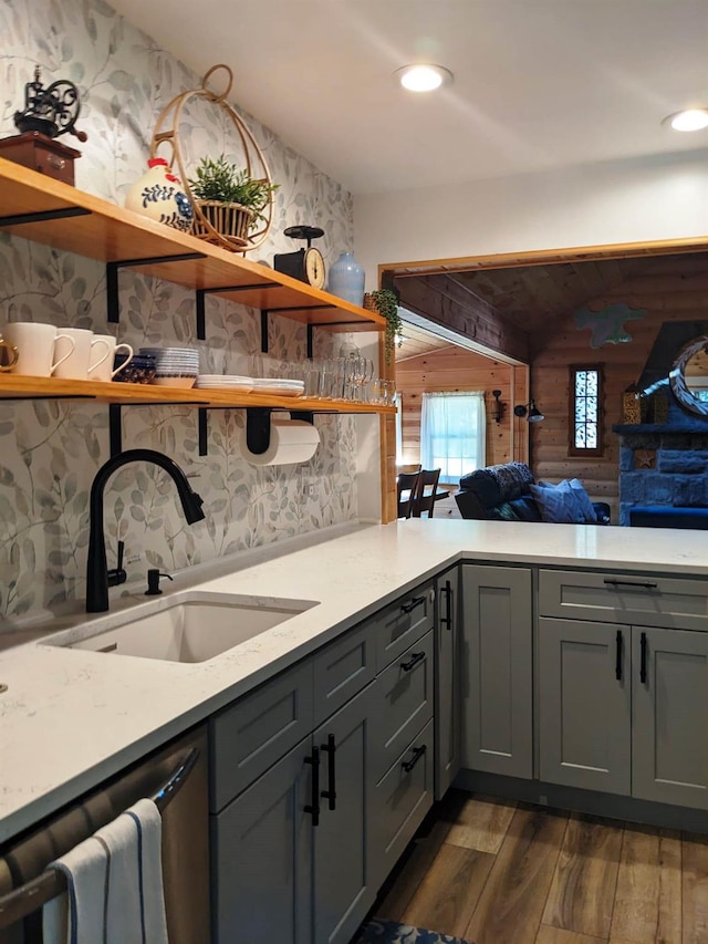 25 E Reindeer Trl, Bethel, NY 12778 - kitchen with dark wood-type flooring, open shelves, a sink, and gray cabinetry
