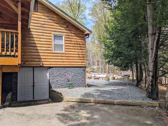 25 E Reindeer Trl, Bethel, NY 12778 - view of side of property featuring log veneer siding