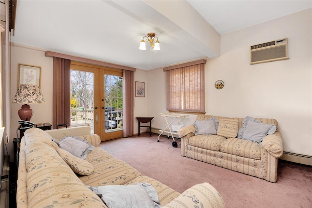 carpeted living room featuring baseboards, french doors, and a wall mounted air conditioner