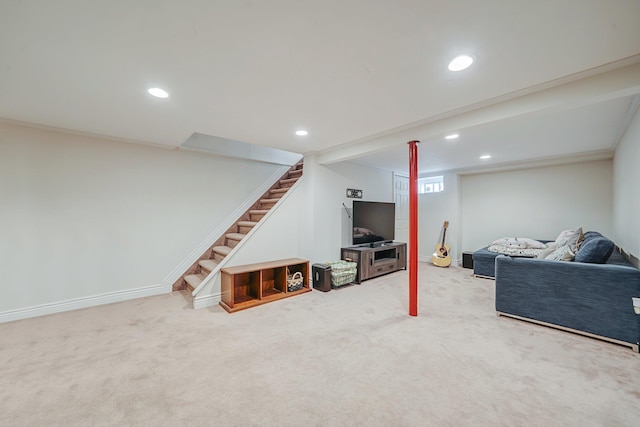 carpeted living area featuring stairway, baseboards, and recessed lighting