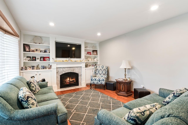 15 Kevin Rd, Commack, NY 11725 - living area featuring wood finished floors, a premium fireplace, and recessed lighting