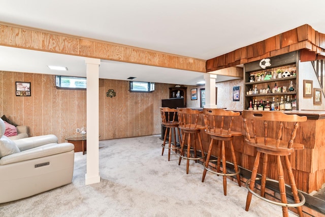 15 Kevin Rd, Commack, NY 11725 - indoor dry bar with wood walls, carpet floors, and healthy amount of natural light