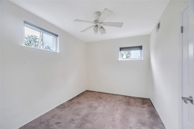 unfurnished room with carpet flooring, ceiling fan, and baseboards