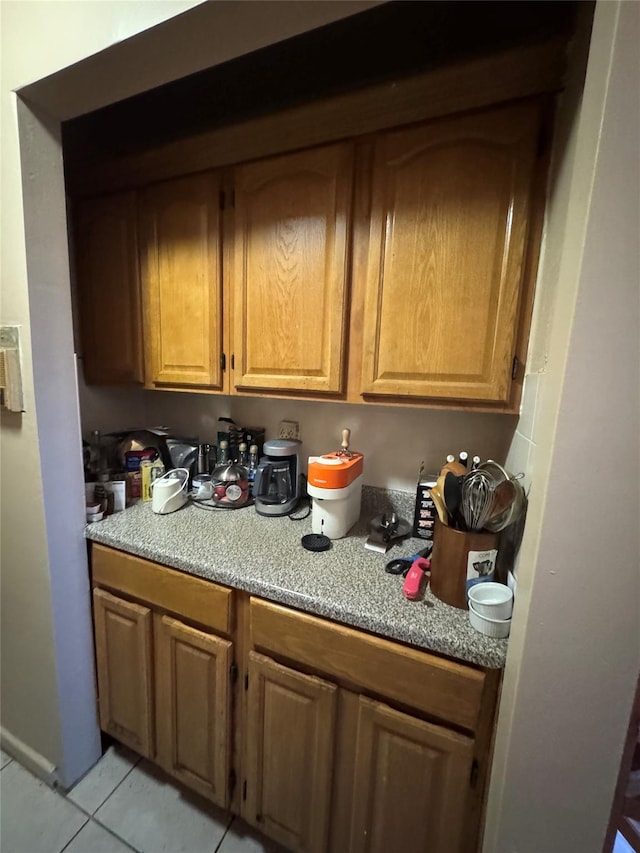 kitchen featuring light tile patterned flooring