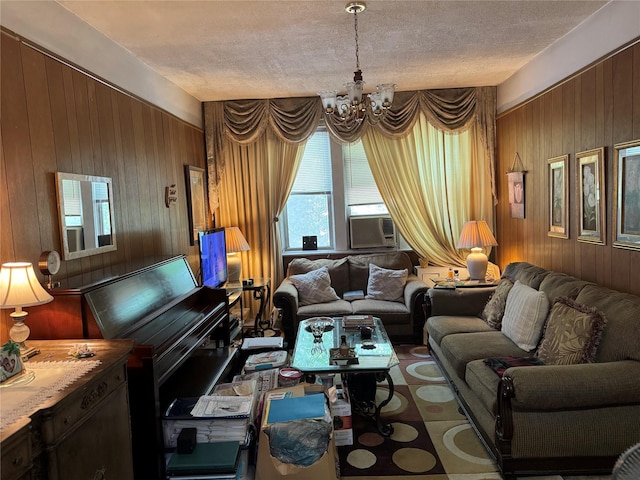 1171 Leland Ave, Bronx, NY 10472 - living room featuring wooden walls, a chandelier, healthy amount of natural light, and a textured ceiling