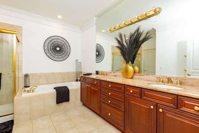 bathroom with double vanity, tile patterned flooring, a shower stall, a sink, and ornamental molding