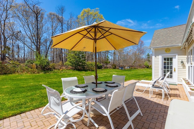 view of patio featuring outdoor dining space
