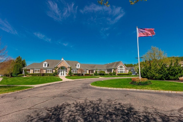 view of front of property with a front lawn