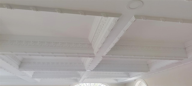 details featuring beamed ceiling