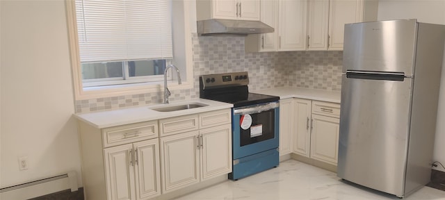 kitchen with appliances with stainless steel finishes, a sink, marble finish floor, a baseboard radiator, and under cabinet range hood
