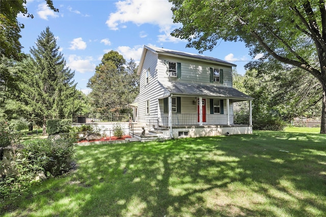16 Nelson Ln, Garrison, NY 10524 - view of front of home with a porch and a front yard