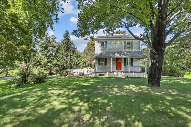 16 Nelson Ln, Garrison, NY 10524 - view of front of property featuring a porch and a front yard