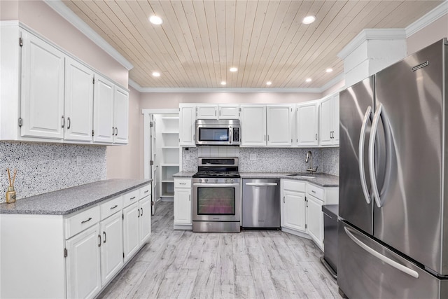 16 Nelson Ln, Garrison, NY 10524 - kitchen with crown molding, appliances with stainless steel finishes, recessed lighting, and a sink