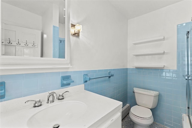 16 Nelson Ln, Garrison, NY 10524 - bathroom featuring tile walls, walk in shower, wainscoting, vanity, and toilet