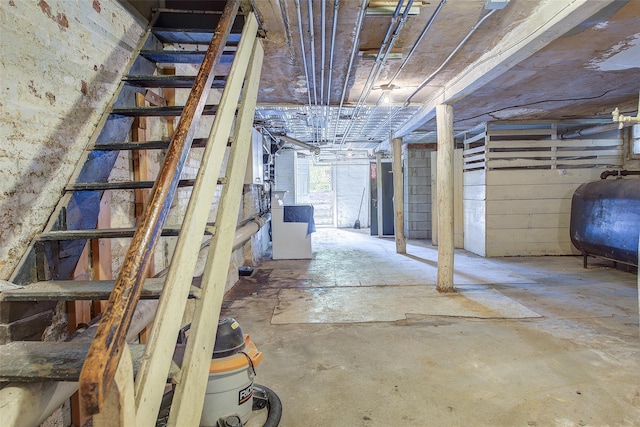 below grade area with heating fuel and stairs