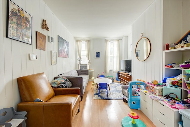 game room featuring light wood finished floors