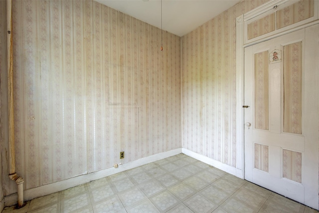 empty room with tile patterned floors