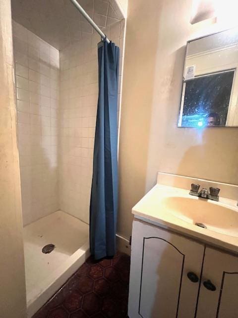 50 Lieper St, Huntington Station, NY 11746 - full bathroom featuring a shower stall, tile patterned flooring, and vanity
