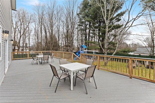 93 Wood Ave, Monticello, NY 12701 - deck featuring outdoor dining area and a playground