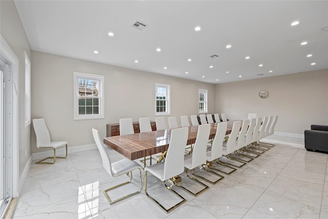 93 Wood Ave, Monticello, NY 12701 - dining space featuring baseboards, visible vents, a wealth of natural light, and marble finish floor