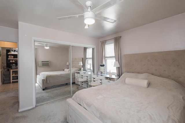 bedroom featuring a ceiling fan, light carpet, and an AC wall unit