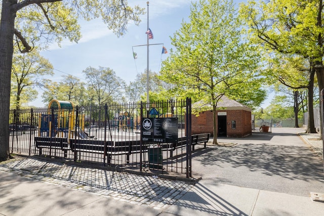 view of gate featuring fence