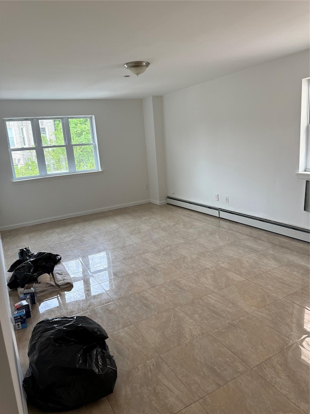 1620 Taylor Ave, Bronx, NY 10460 - spare room featuring baseboards and baseboard heating