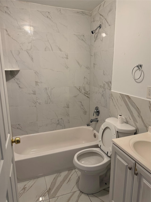 1620 Taylor Ave, Bronx, NY 10460 - bathroom with shower / bath combination, tile walls, vanity, toilet, and marble finish floor