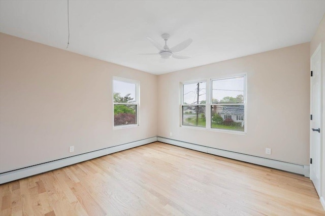 105 Phyllis Dr, Lindenhurst, NY 11757 - empty room with wood finished floors, a ceiling fan, a baseboard radiator, a baseboard heating unit, and baseboards