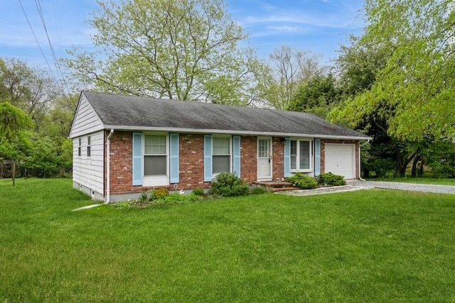900 Cedar Dr, Southold, NY 11971 - ranch-style house featuring gravel driveway, brick siding, a front lawn, an attached garage, and a shingled roof