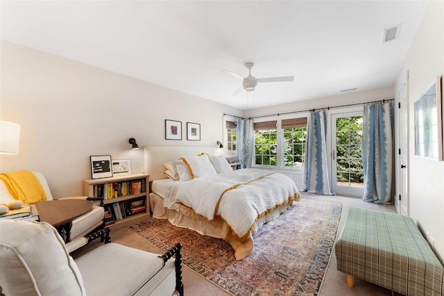 carpeted bedroom featuring a ceiling fan