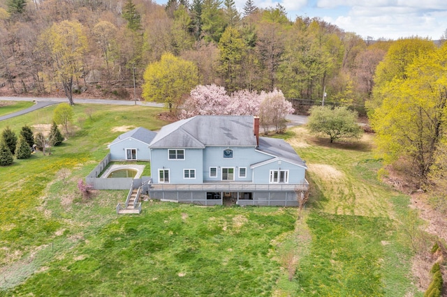 drone / aerial view with a forest view