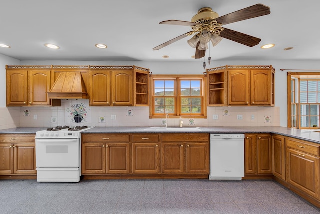 kitchen with a sink, open shelves, premium range hood, and white appliances