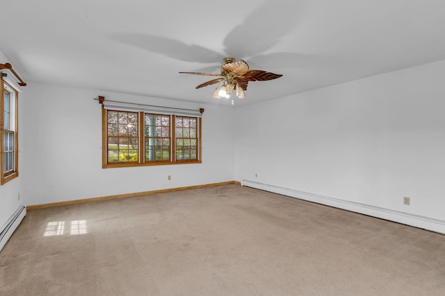 unfurnished room featuring carpet flooring, a ceiling fan, baseboards, and a baseboard radiator