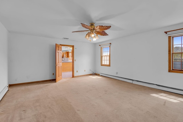 unfurnished room featuring baseboards, carpet, ceiling fan, and a baseboard heating unit