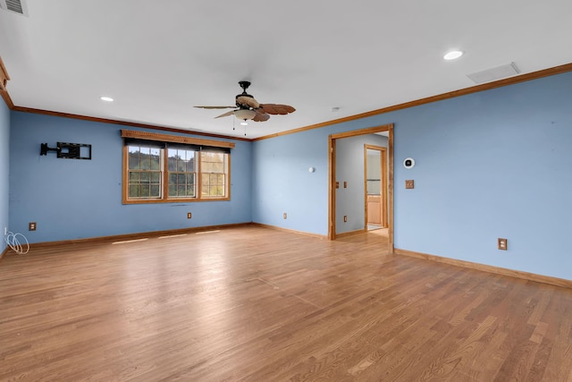 empty room with crown molding, ceiling fan, baseboards, and light wood-style flooring