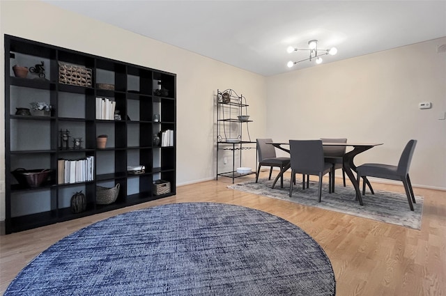 17 Cherry Ct, Highland Mills, NY 10930 - dining space with baseboards, a notable chandelier, and wood finished floors