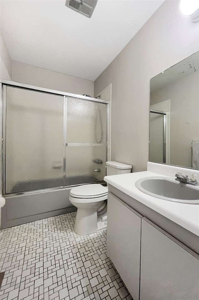 17 Cherry Ct, Highland Mills, NY 10930 - full bath with vanity, combined bath / shower with glass door, toilet, and visible vents