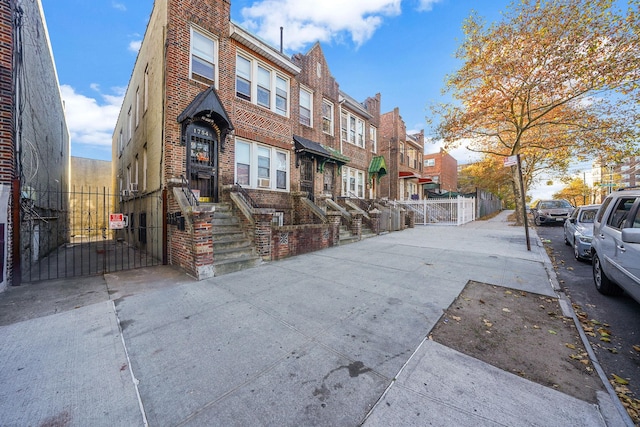 1754 Seward Ave, Bronx, NY 10473 - exterior space with brick siding, fence, a residential view, and a gate