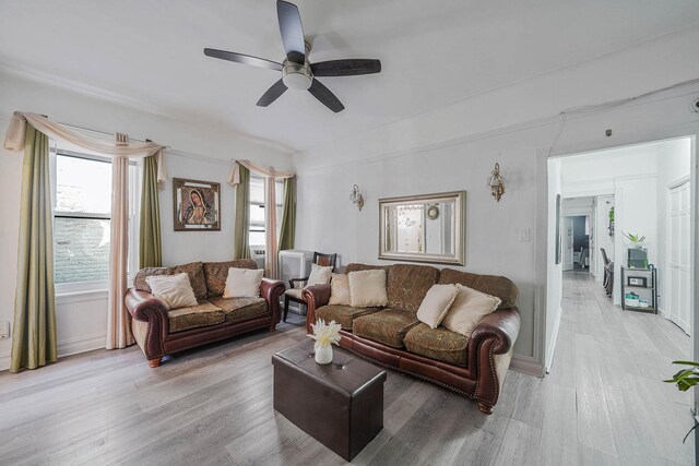 1754 Seward Ave, Bronx, NY 10473 - living room with ceiling fan and light wood finished floors