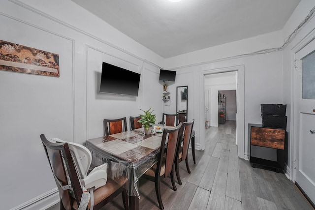 1754 Seward Ave, Bronx, NY 10473 - dining space with wood finished floors