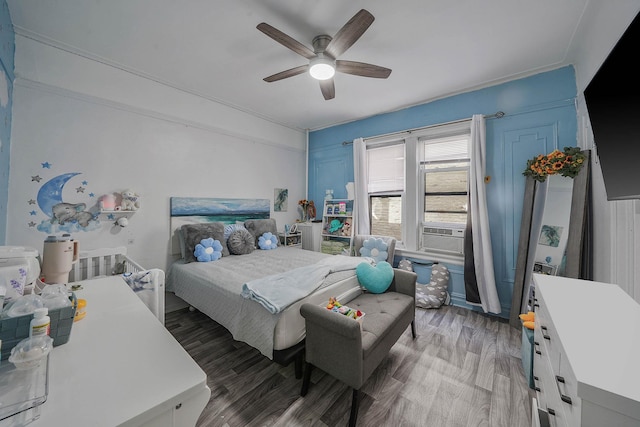 1754 Seward Ave, Bronx, NY 10473 - bedroom featuring ceiling fan, cooling unit, and light wood-type flooring
