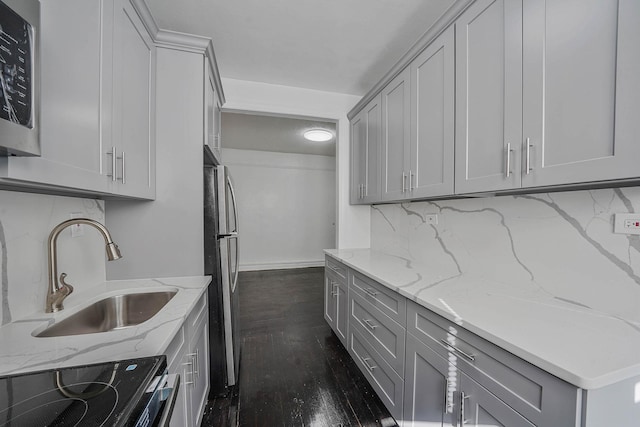 1754 Seward Ave, Bronx, NY 10473 - kitchen featuring freestanding refrigerator, gray cabinets, electric range oven, a sink, and backsplash
