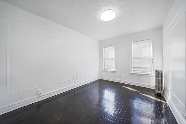 1754 Seward Ave, Bronx, NY 10473 - unfurnished room with a textured ceiling
