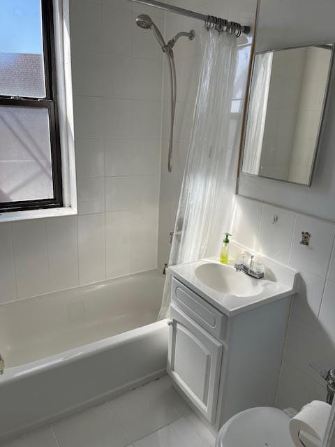 83-44 Lefferts Blvd Unit 6M, Kew Gardens, NY 11415 - bathroom featuring vanity, tile patterned flooring, toilet, and shower / tub combo