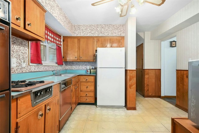 54 Schuyler Dr, Commack, NY 11725 - kitchen featuring freestanding refrigerator, dishwashing machine, light flooring, wainscoting, and a ceiling fan