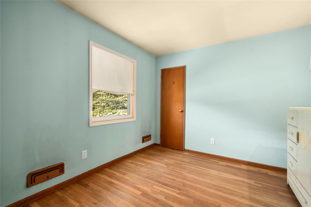 54 Schuyler Dr, Commack, NY 11725 - spare room featuring light wood finished floors and baseboards